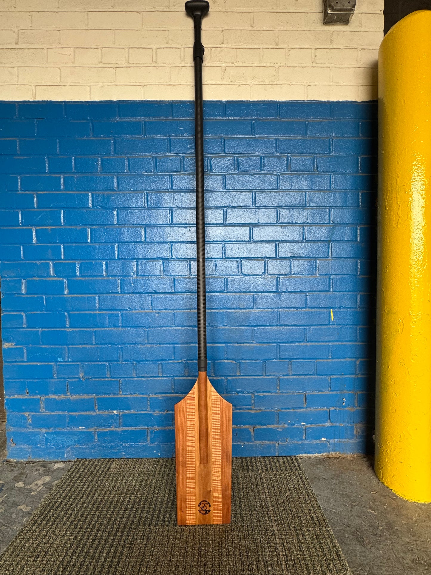 Custom wooden carbon fiber paddle for Lake Erie paddleboarding