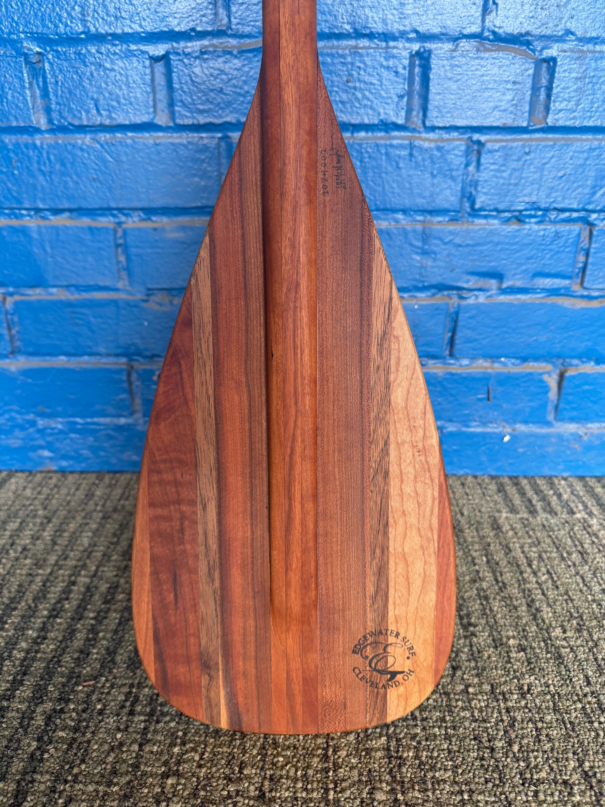 Handmade cherry and walnut wooden SUP paddle by Edgewater Surf