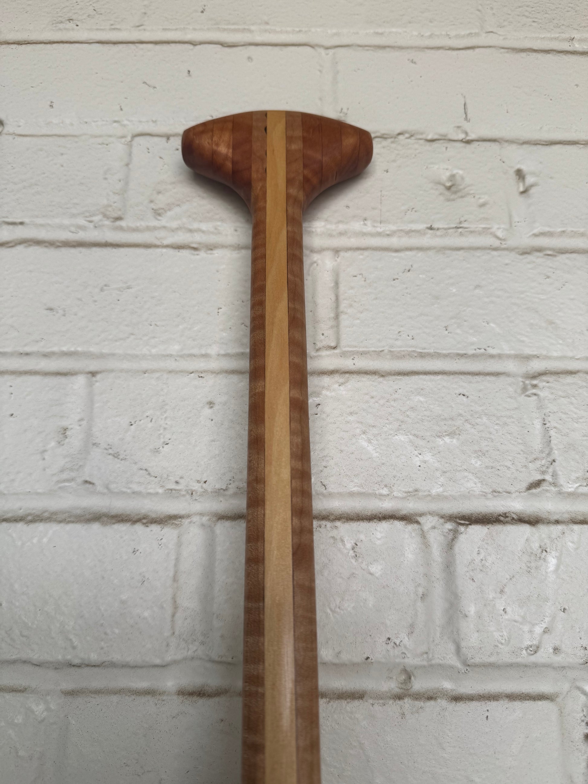 Curly maple and basswood SUP paddle handmade in Cleveland Ohio