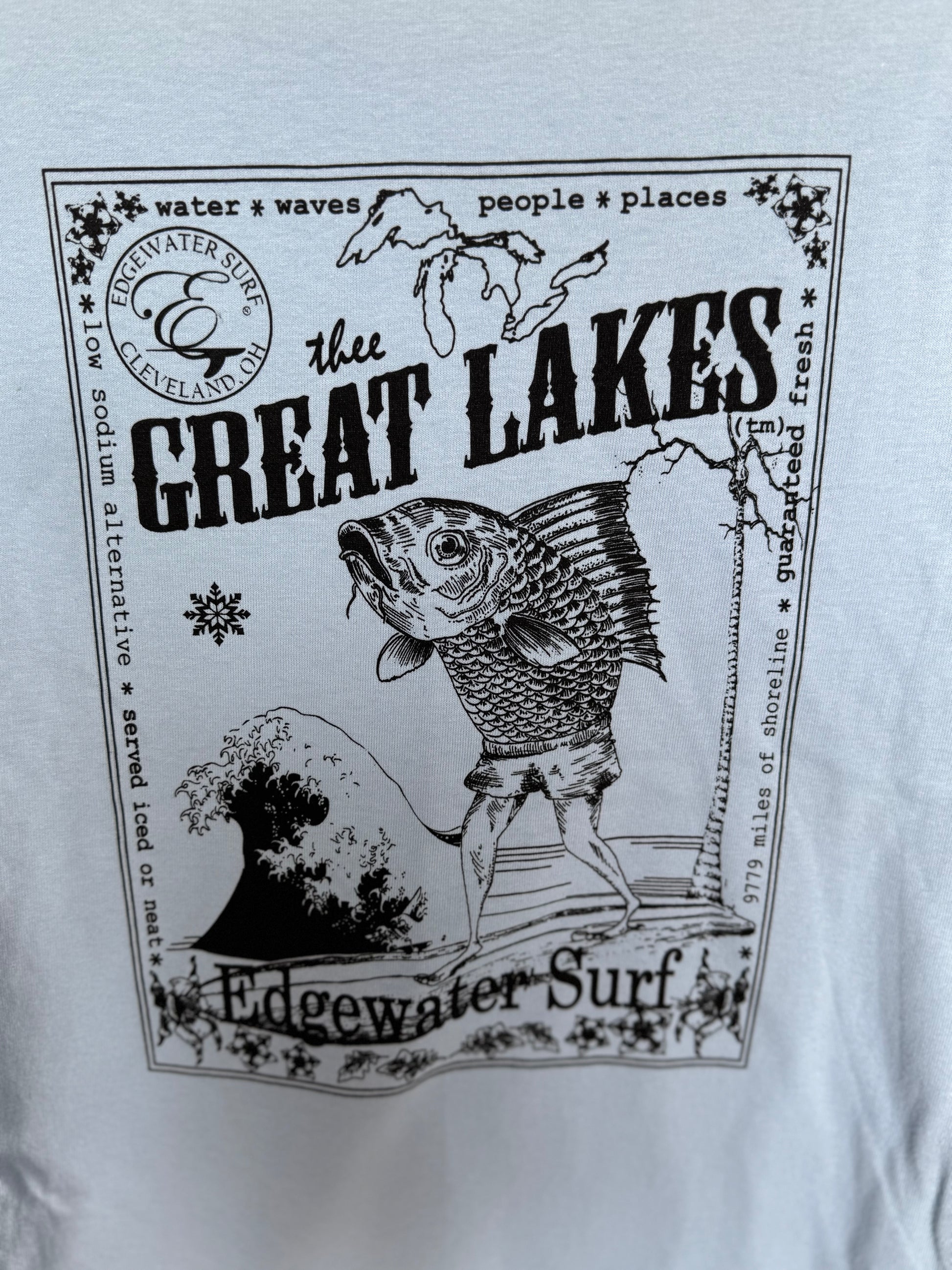 light blue shirt with great lake fish